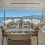 Custom Line Navetta 33_Upper deck dining area